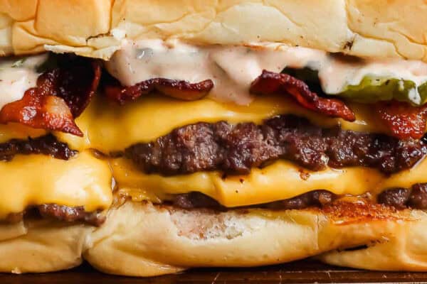 Close-up image of smash burger sliders.