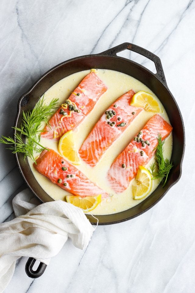 Creamy Lemon Caper Salmon Skillet - a delicious and creamy weeknight meal your whole family will love!! #whole30 #paleo #salmon #weeknightdinner Creamy Lemon Caper Salmon Skillet