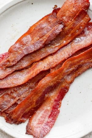Plate of oven baked bacon.